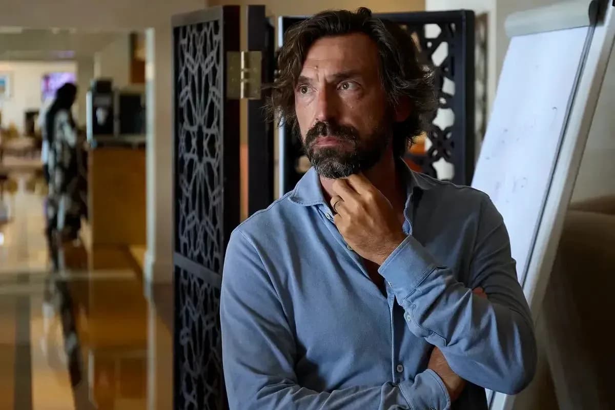 Man in blue shirt thinking in hotel lobby