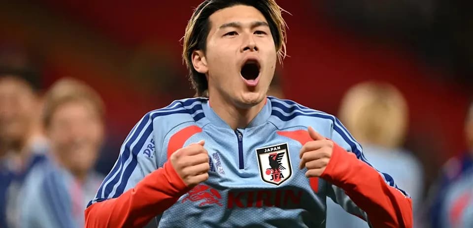 Player celebrating during warm-up for Japan team