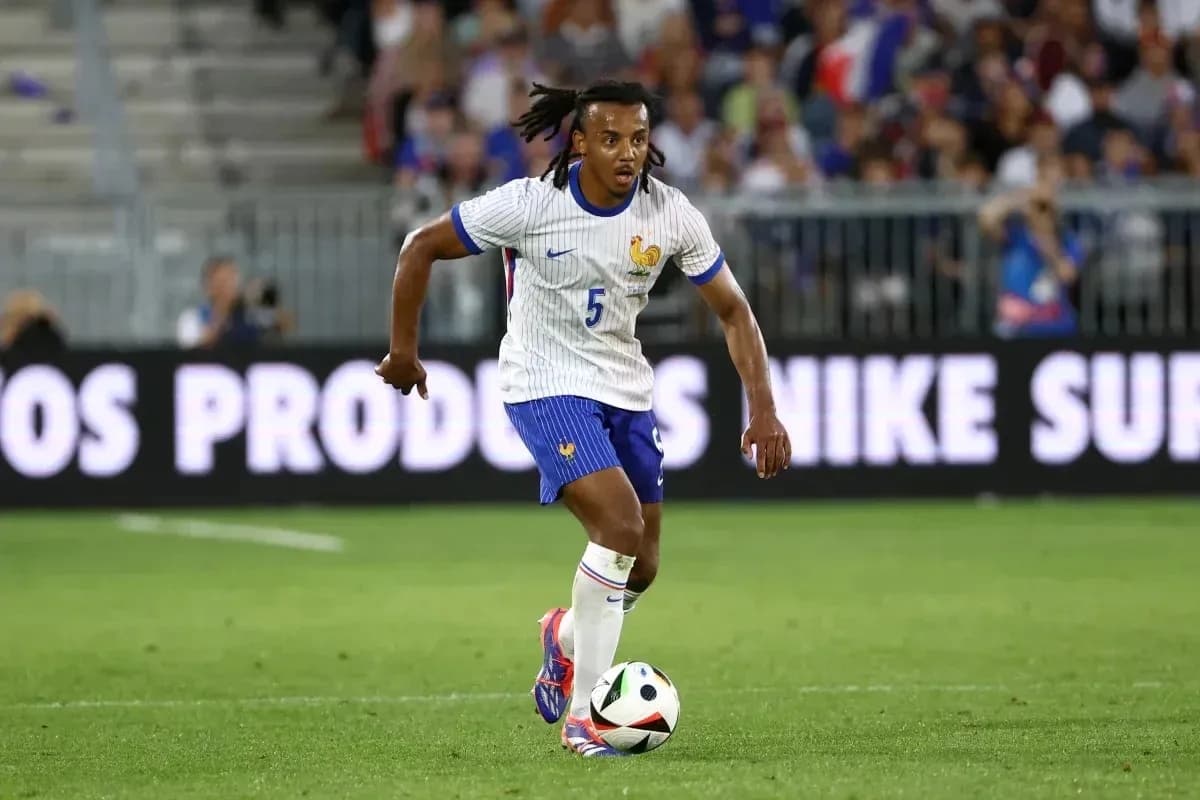 Player dribbling a soccer ball during match