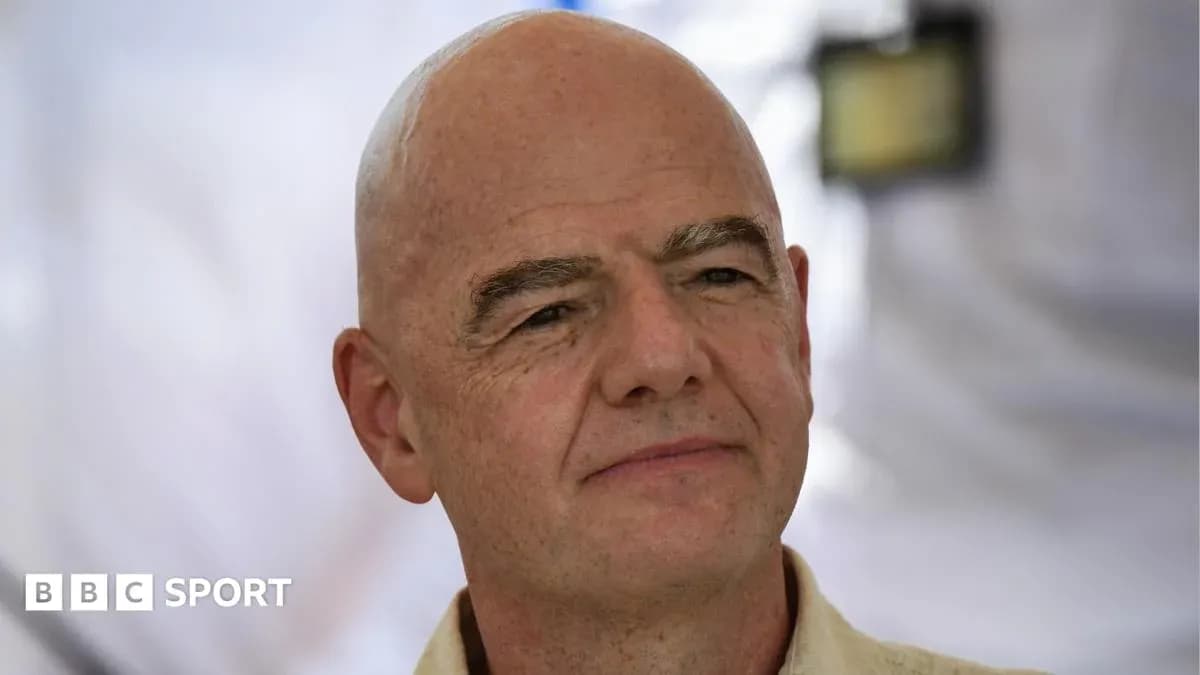 Man with bald head and neutral expression