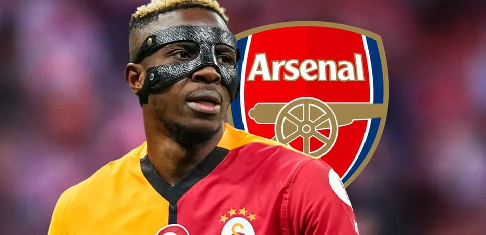 Player wearing a mask with Arsenal logo background