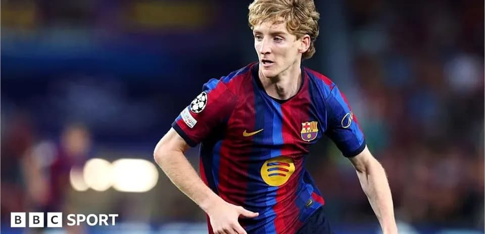 Player in FC Barcelona kit running on the pitch