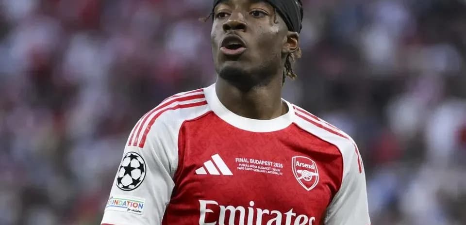 Arsenal player in red jersey during match