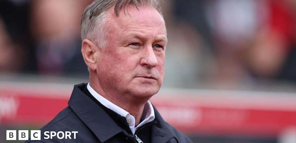Manager observing the match from the sidelines