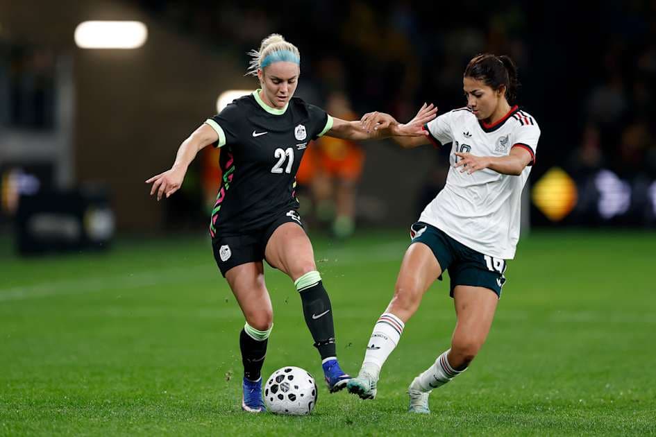 Two players contesting the ball during a soccer match