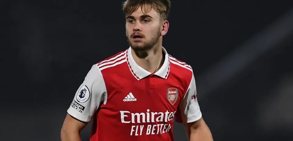 Player in Arsenal jersey during match action