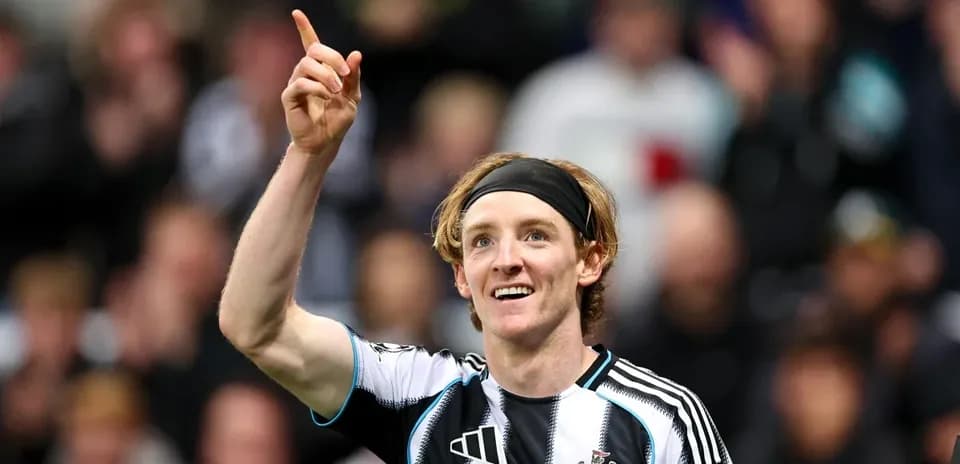 Player celebrating a goal with raised finger