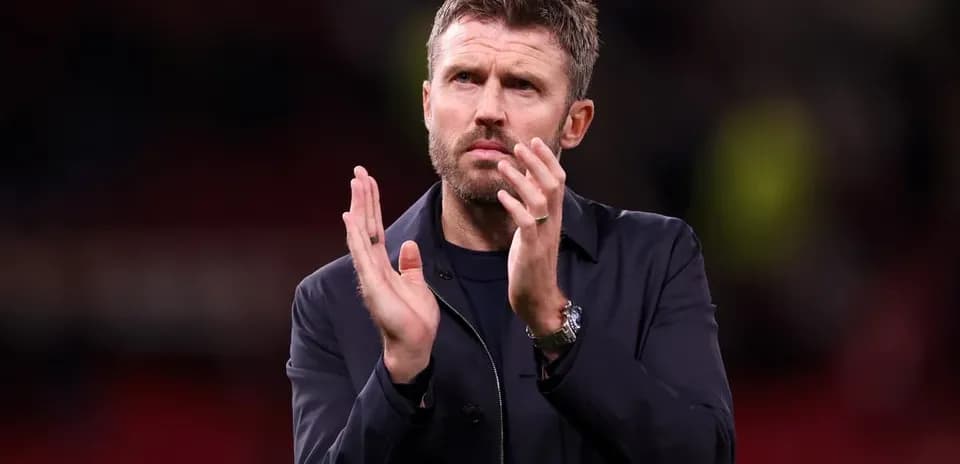 Coach applauding after the match on the field