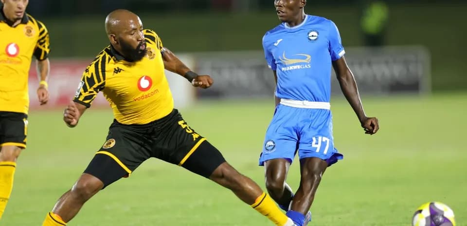 Two players competing for the ball during soccer match