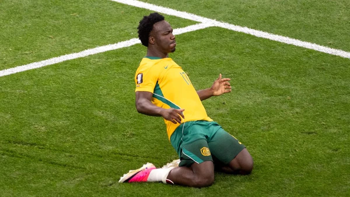Player celebrating on the field after scoring goal