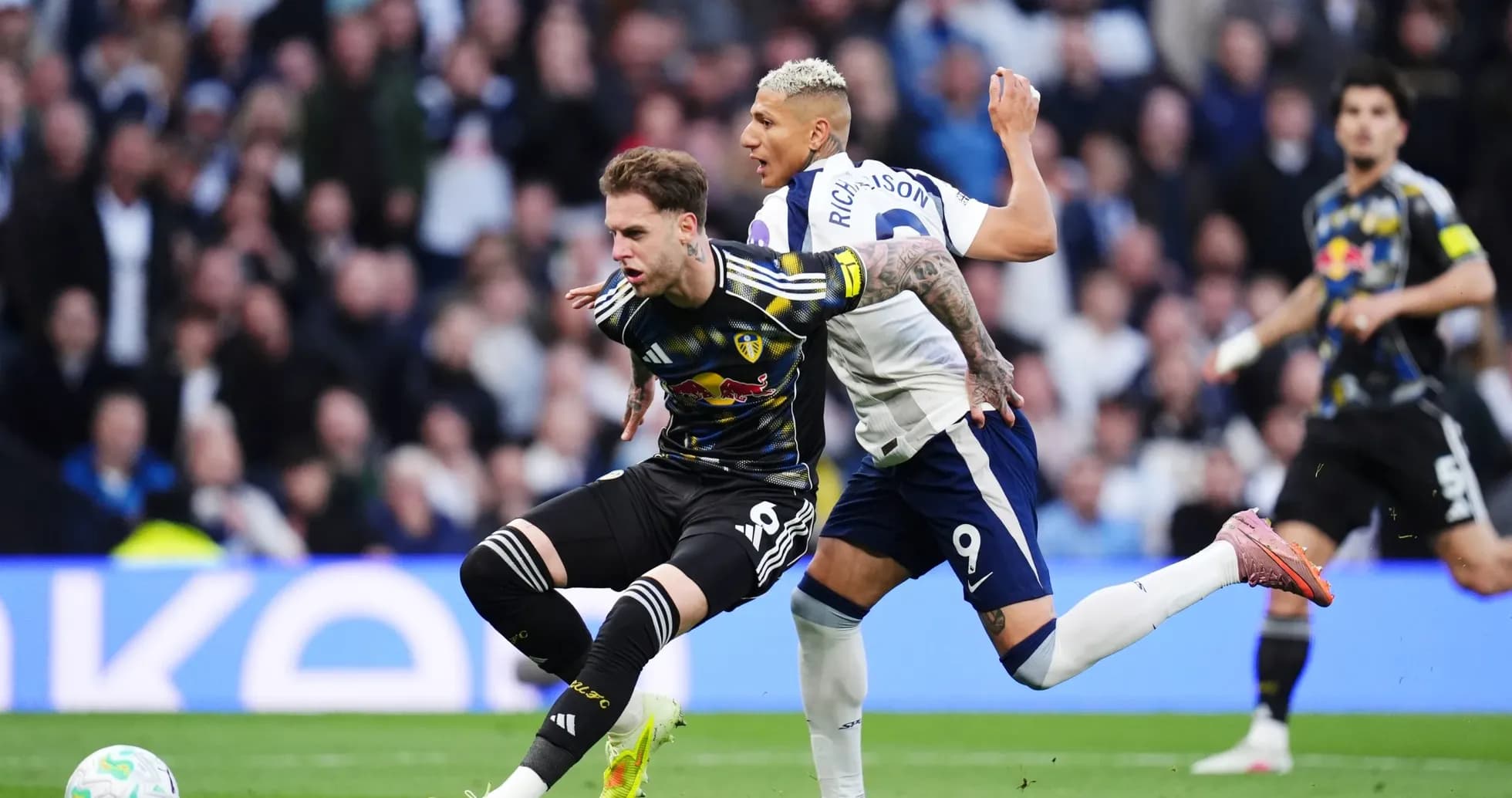 Player challenge during Tottenham vs Leeds match