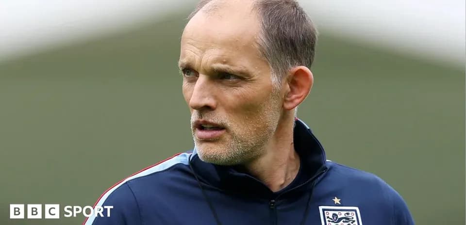 Coach observing during training session at pitch