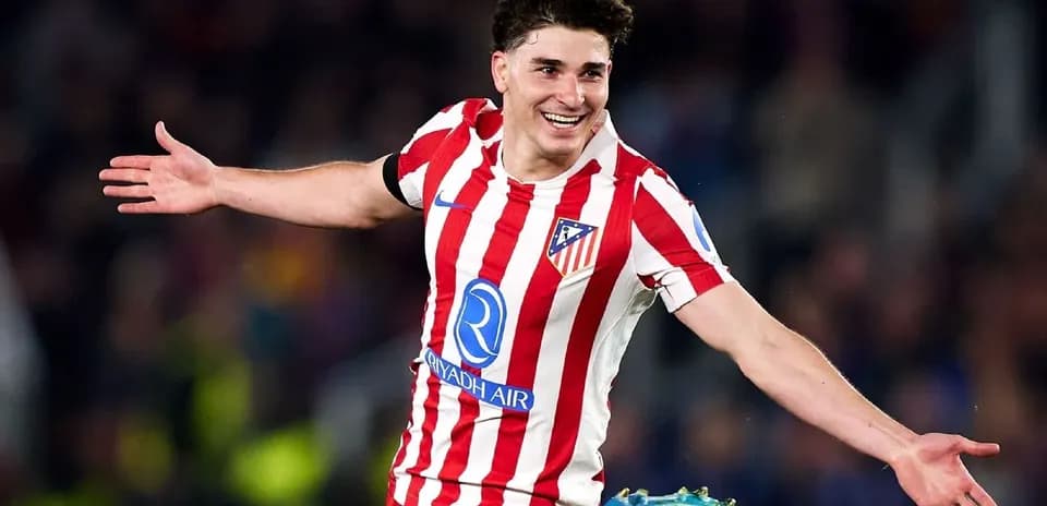 Player celebrating a goal in Atlético Madrid jersey