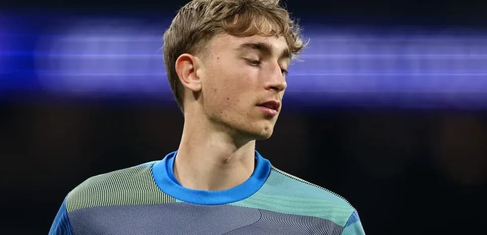 Goalkeeper wearing Real Madrid jersey during match