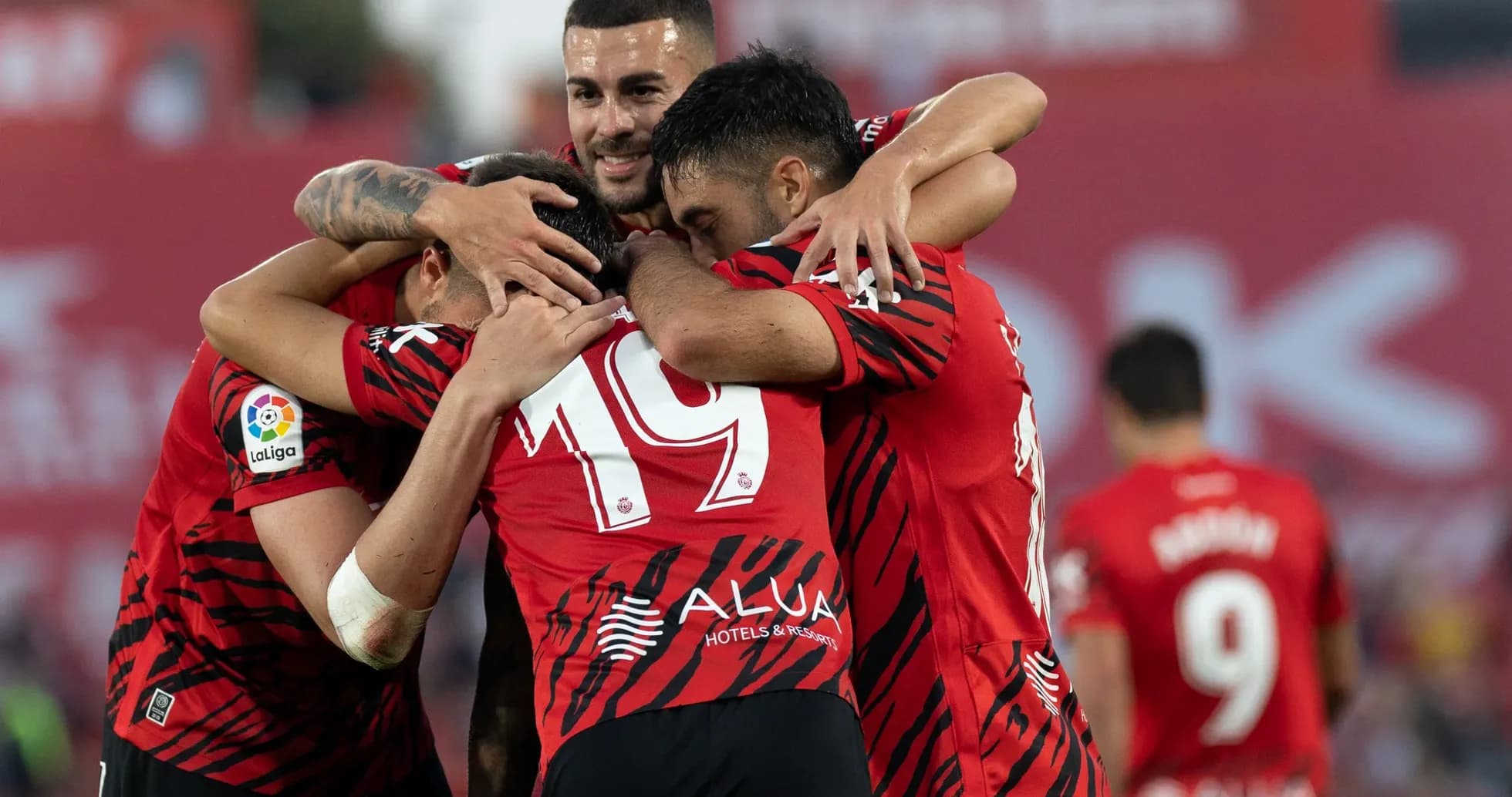 Mallorca players celebrating a goal during match