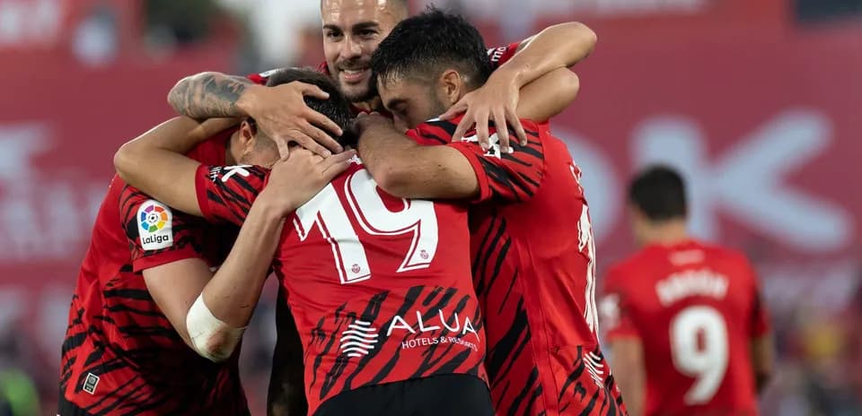 Mallorca players celebrating a goal during match