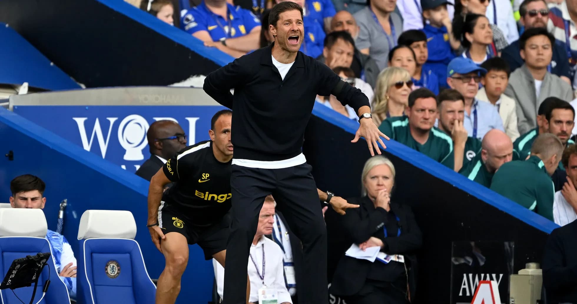Coach shouting instructions from the sidelines during match