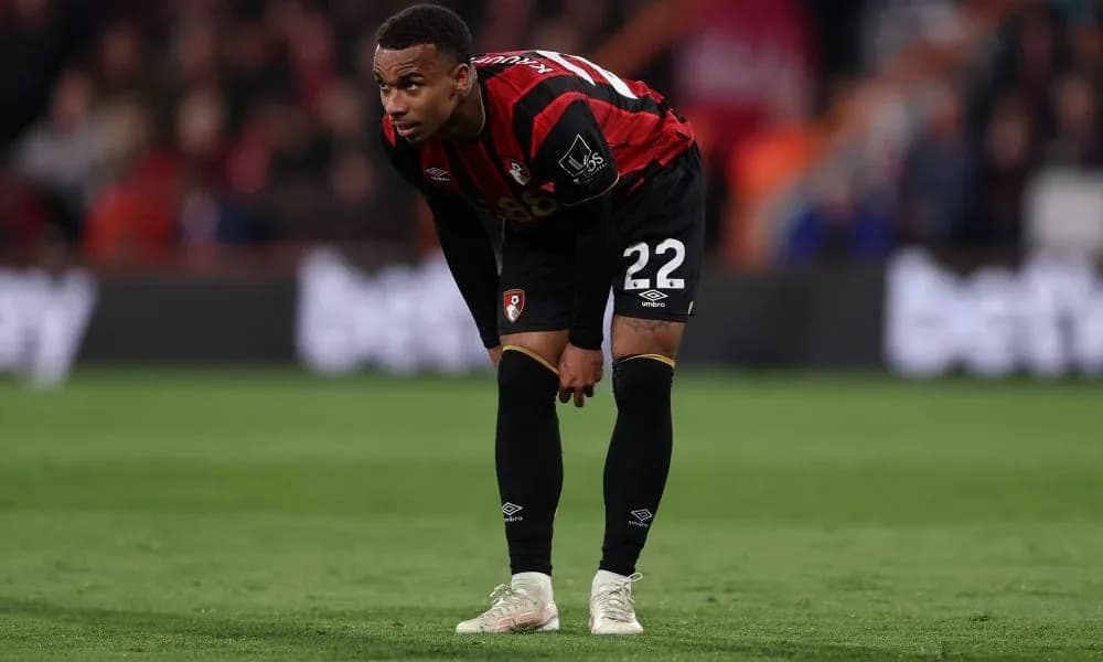 Bournemouth player bending over on the pitch