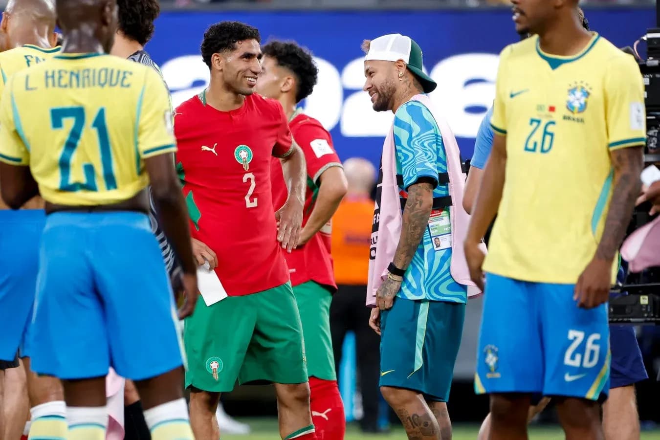 Players interacting on field after match