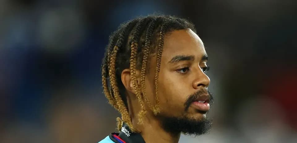 Player with braided hair on the field