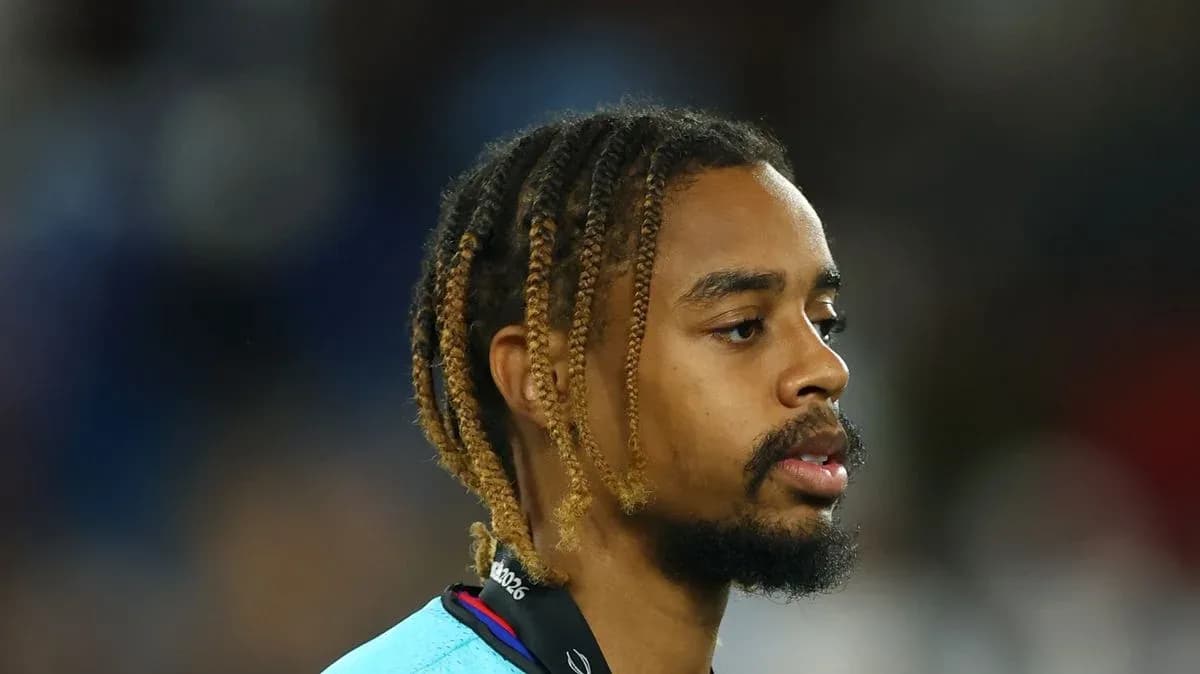 Player with braided hair on the field