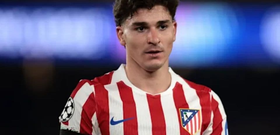 Player in Atlético Madrid jersey during match