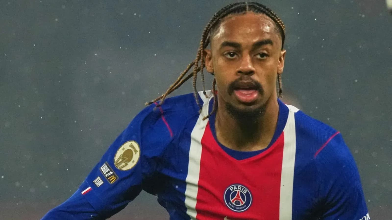 Player in action wearing Paris Saint-Germain jersey