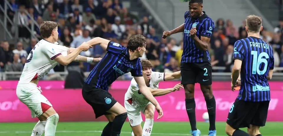 Inter player heading the ball during match