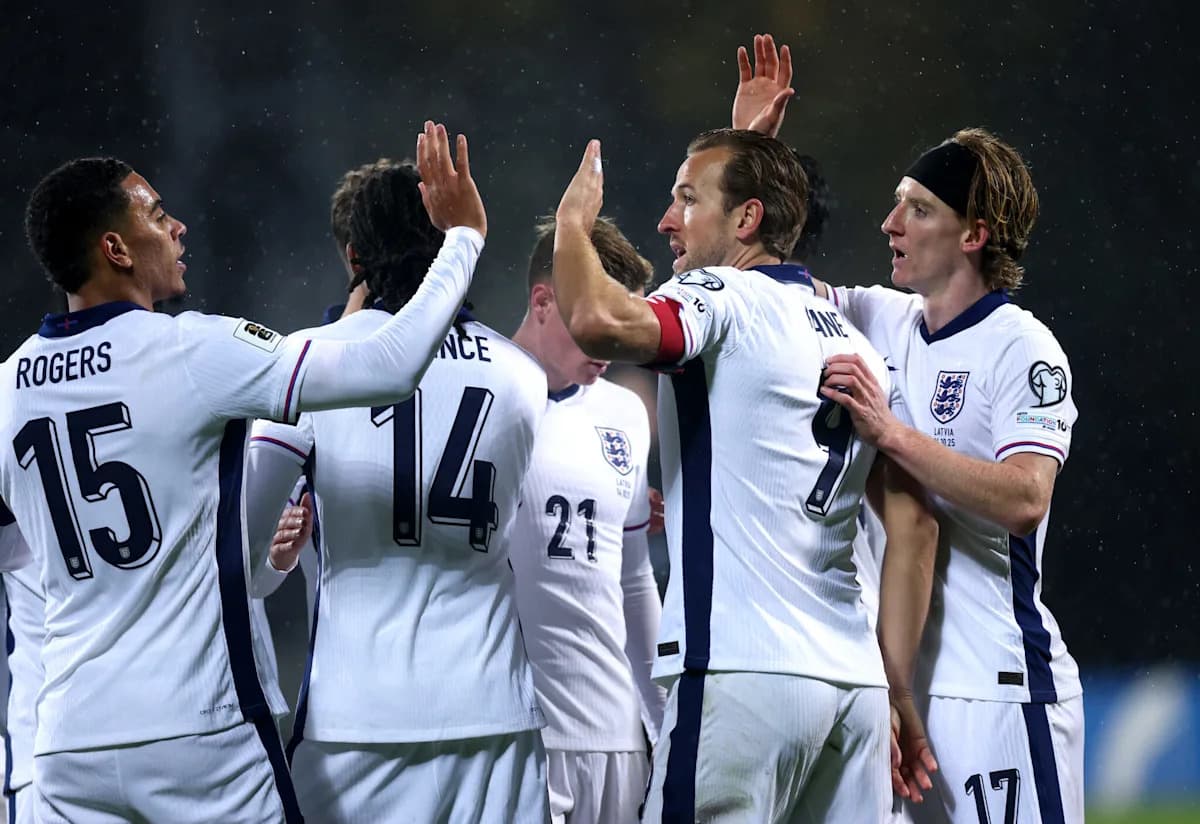 England players celebrating a goal together