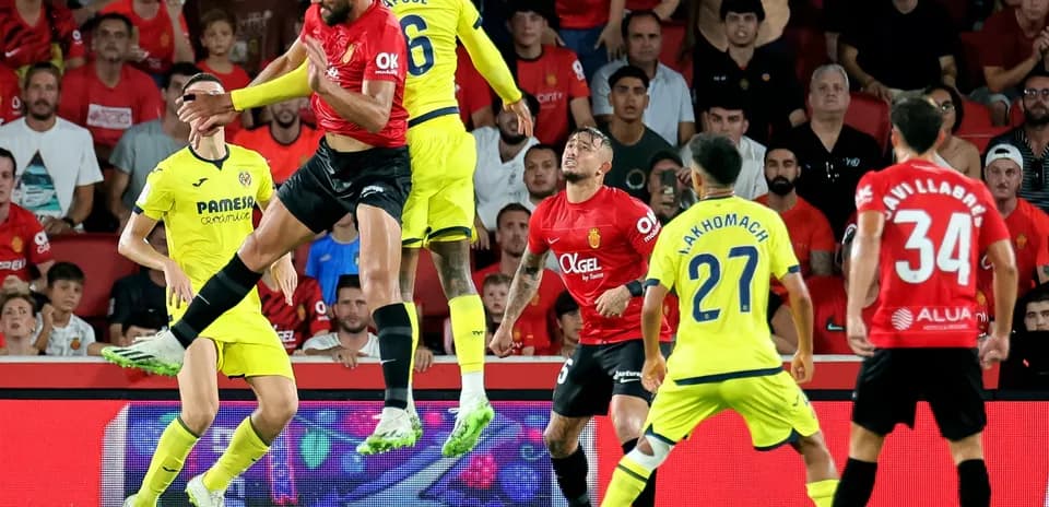 Players contesting for the ball during Mallorca match
