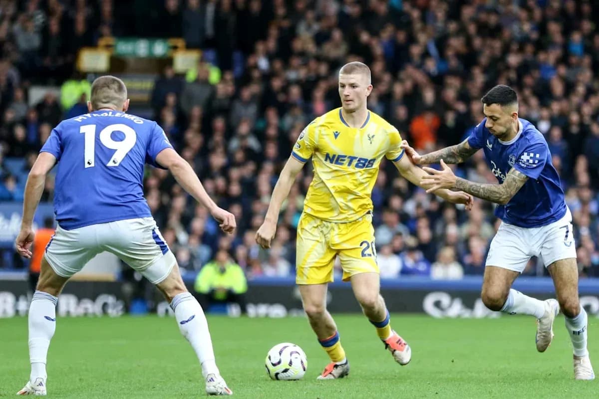 Two players contesting the ball during a match
