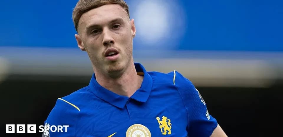 Player wearing blue Chelsea jersey on the field