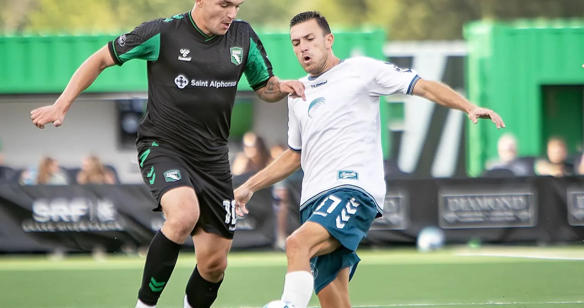 Spokane Velocity player tackling Boise opponent