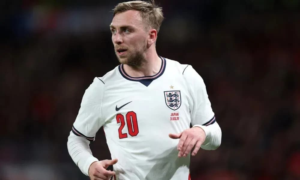 Player wearing England kit during match action