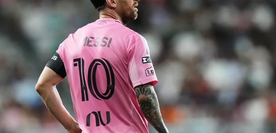 Player wearing pink jersey with number 10