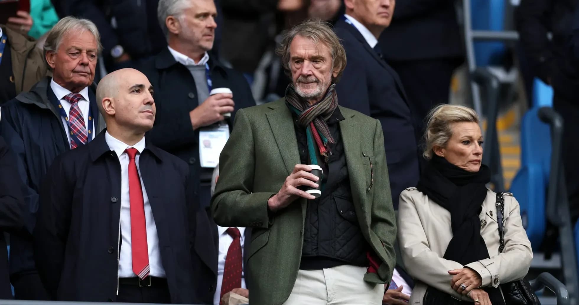 Group of spectators watching a sporting event