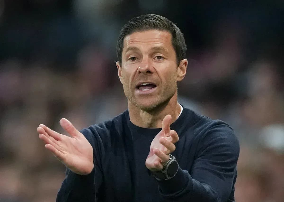 Coach gesturing during a match from the sidelines