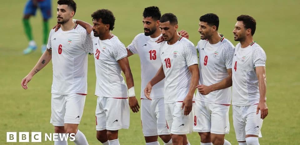 Iranian football players celebrating on the field