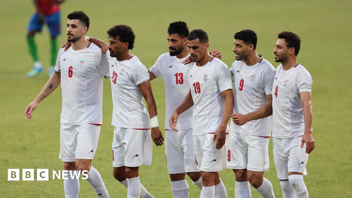 Iranian football players celebrating on the field