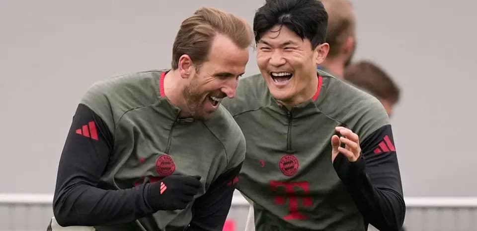 Players laughing together during Bayern Munich training