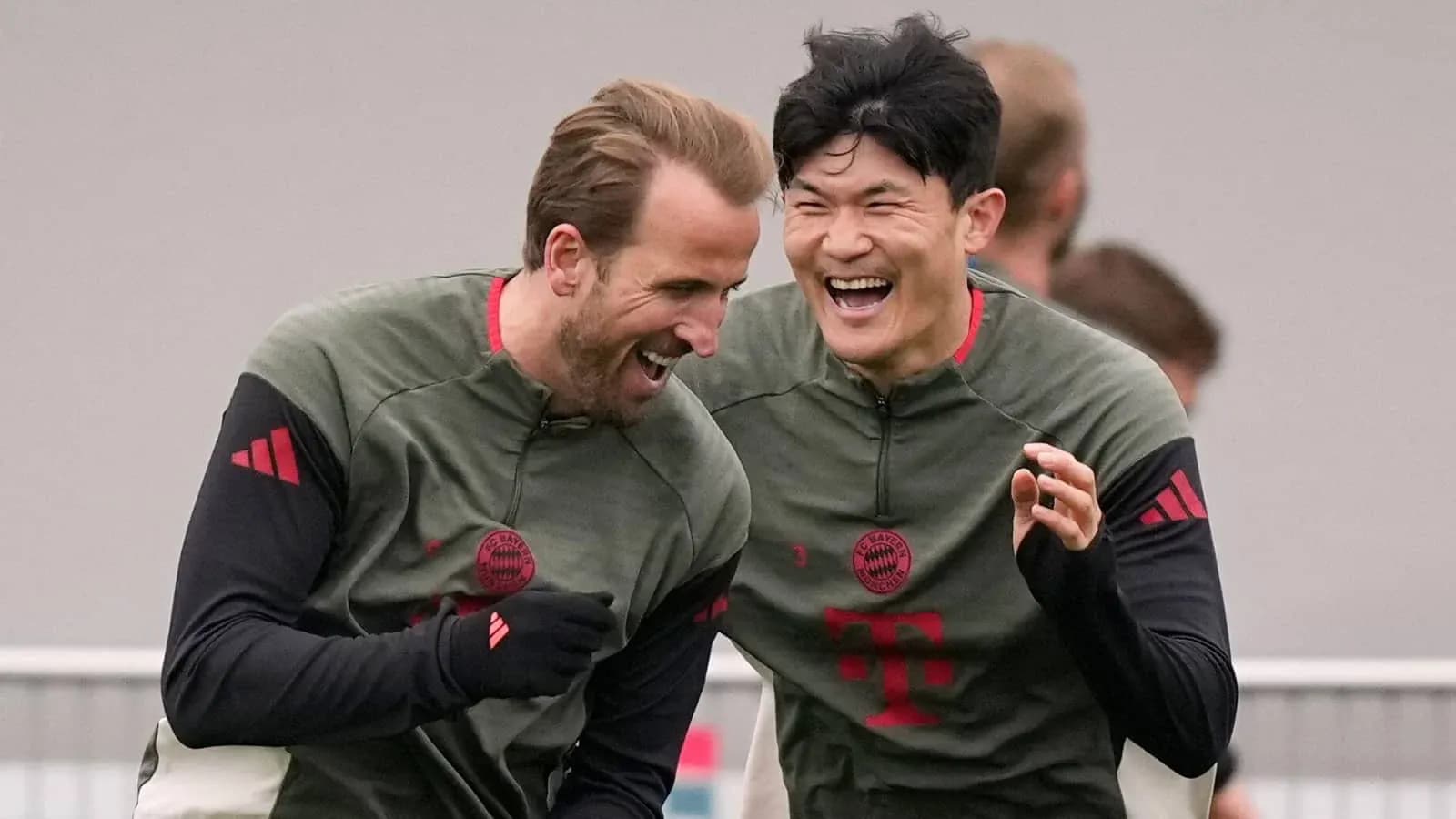 Players laughing together during Bayern Munich training