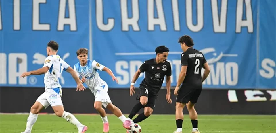 Universitatea Craiova players in action during match