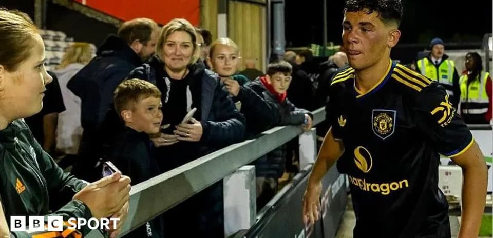 Player walking past fans after match
