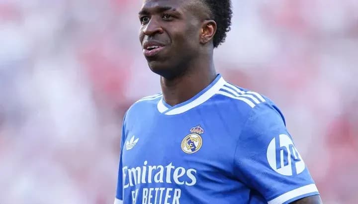 Vinicius Junior in Real Madrid jersey on pitch