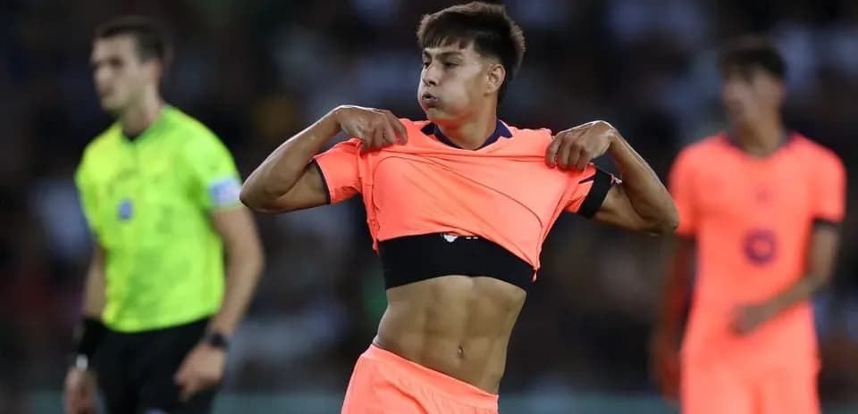 Player changing jersey during a football match