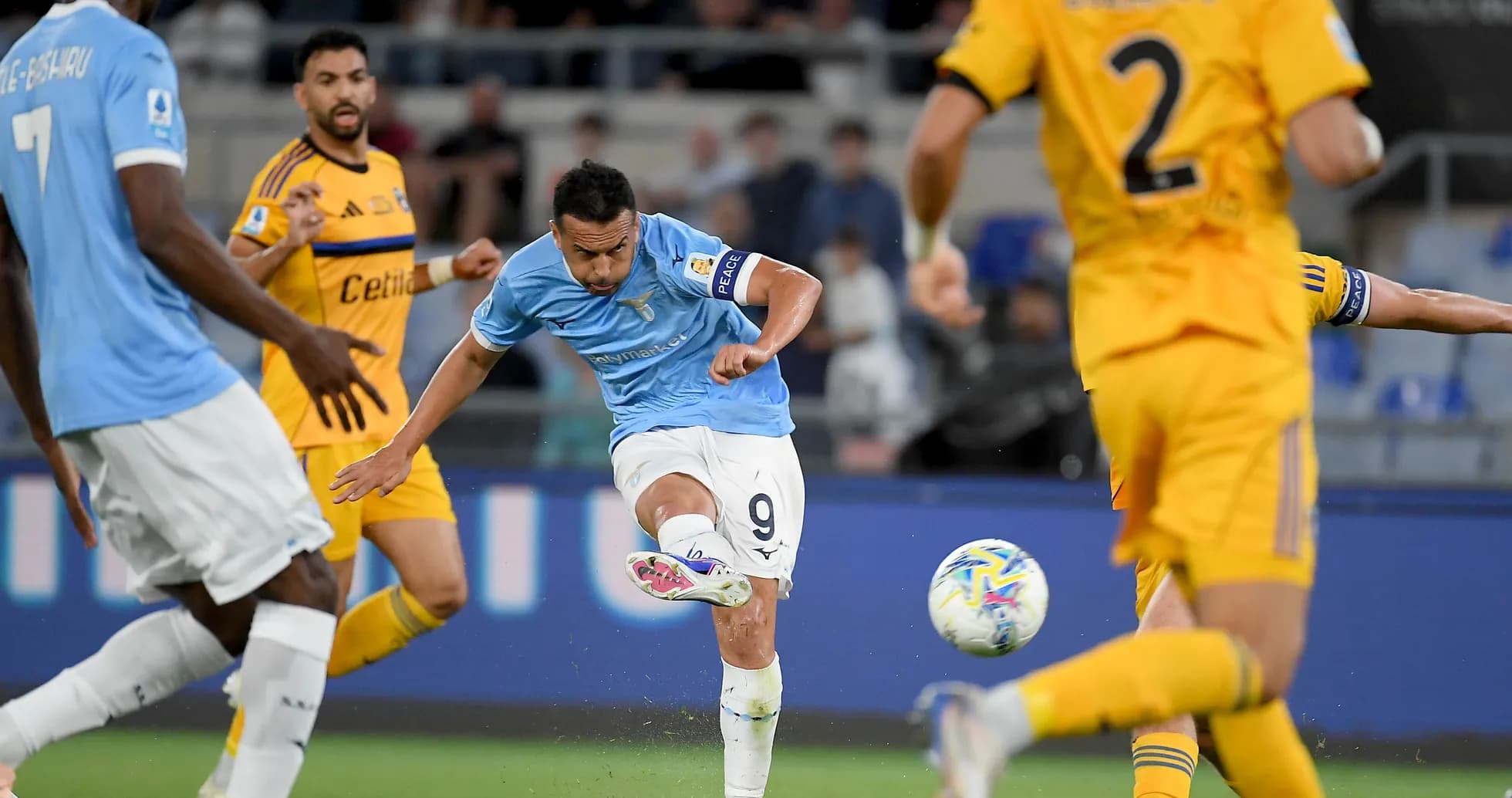 Lazio player shooting at goal during match