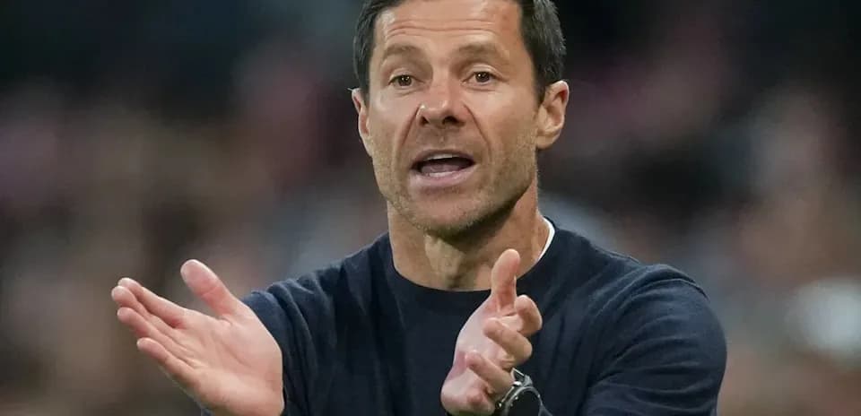 Coach gesturing during a match on the sidelines