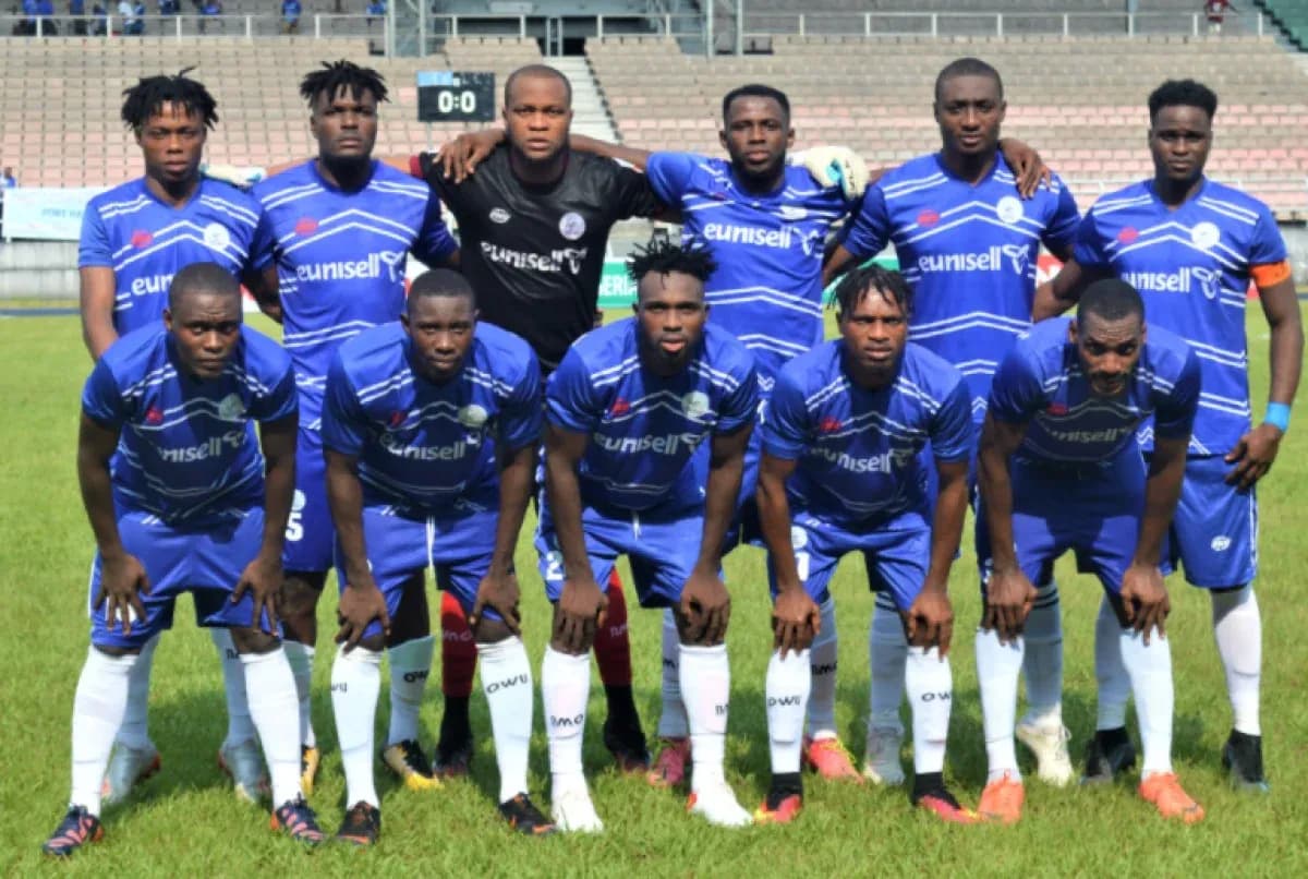 Rivers United team posing before the match