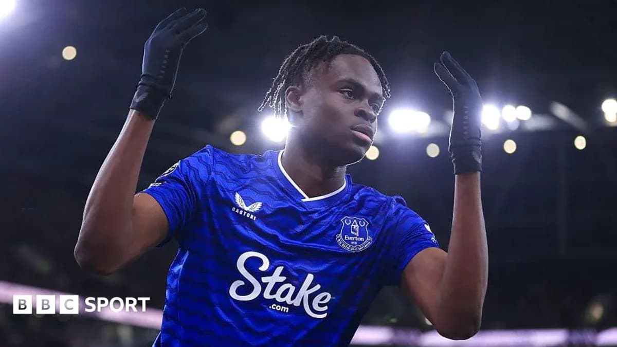 Player celebrating during match in Everton kit