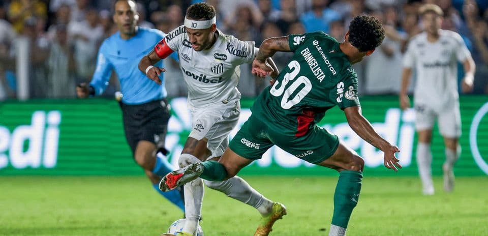 Player dribbling past defender during soccer match